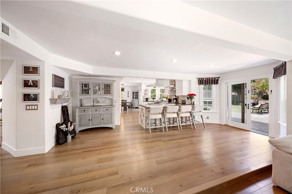 Dining room, Fireplace, Interior, Kitchen, Recessed Lighting, Wood Texture Flooring