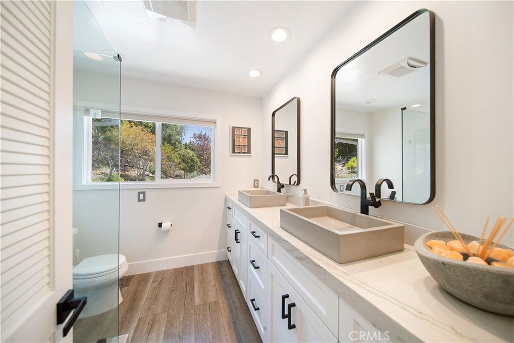 Bathroom, Dual Sink Vanities, Interior, Recessed Lighting, Wood Texture Flooring