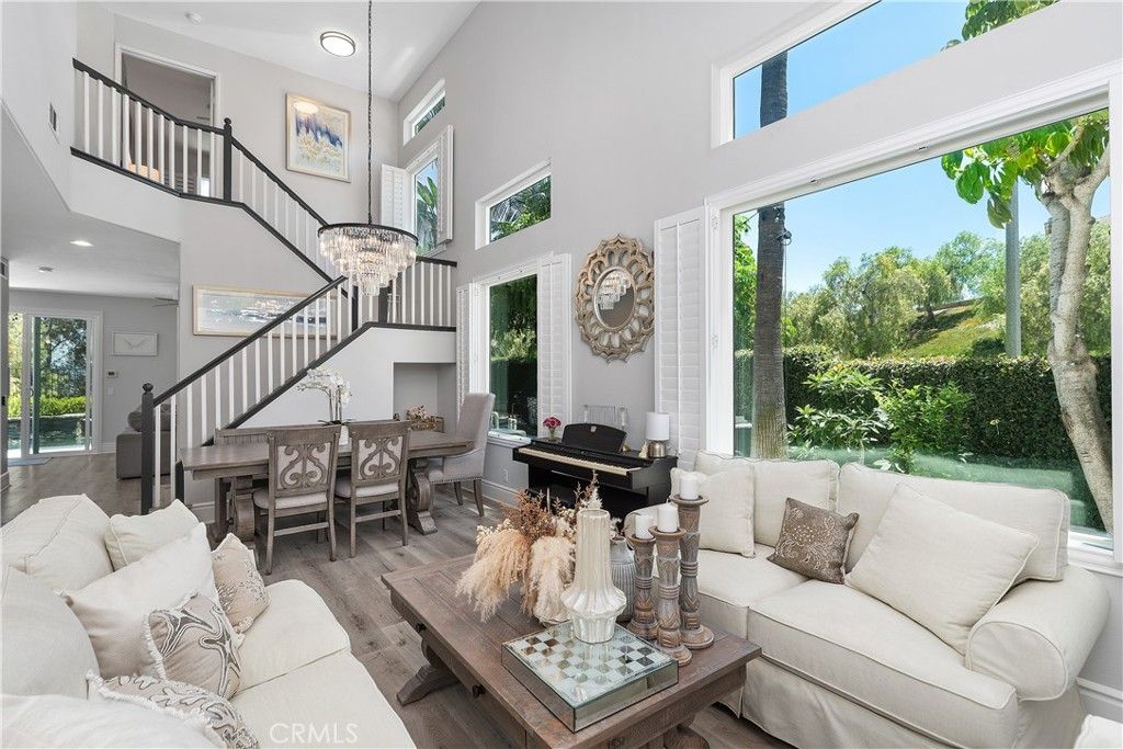 Chandelier, Dining room, Interior, Living room, Piano, Recessed Lighting, Wood Texture Flooring