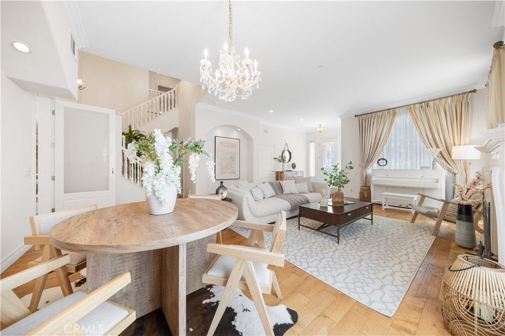 Chandelier, Dining room, Fireplace, Interior, Living room, Piano, Recessed Lighting, Wood Texture Flooring