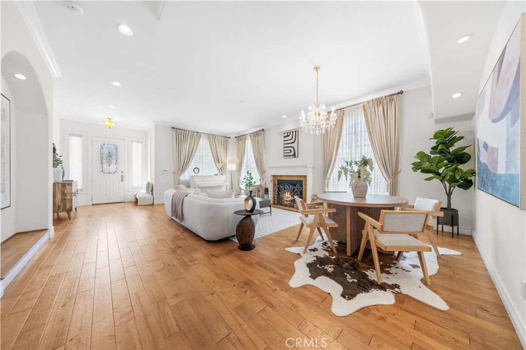 Chandelier, Dining room, Fireplace, Interior, Living room, Recessed Lighting, Wood Texture Flooring
