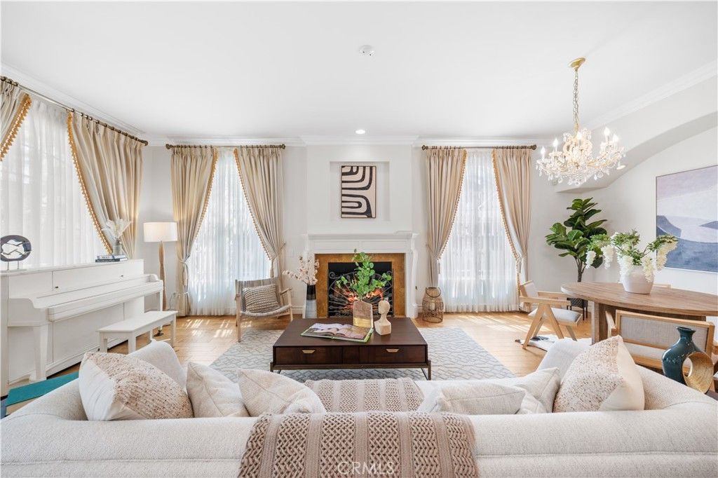 Chandelier, Fireplace, Interior, Living room, Piano, Recessed Lighting, Wood Texture Flooring