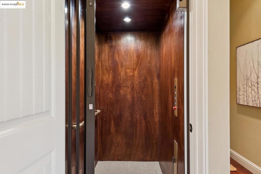 Elevator, Interior, Recessed Lighting, Wooden Ceilings, Wooden Walls