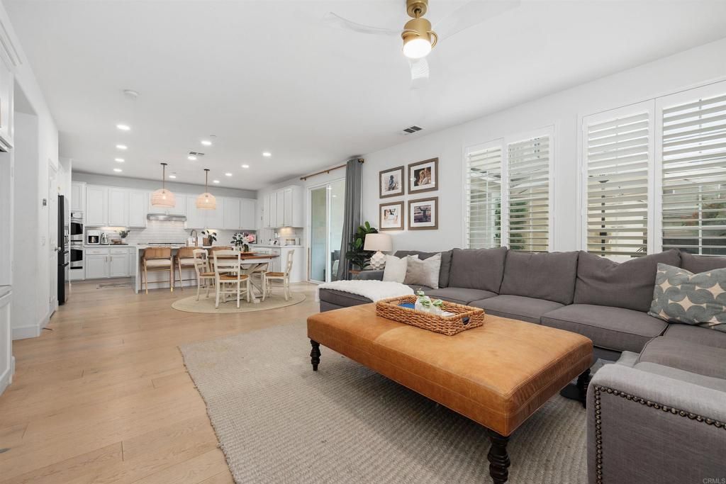 Dining room, Interior, Kitchen, Living room, Pendant Lights, Recessed Lighting, Stainless Steel Appliances, Wood Texture Flooring
