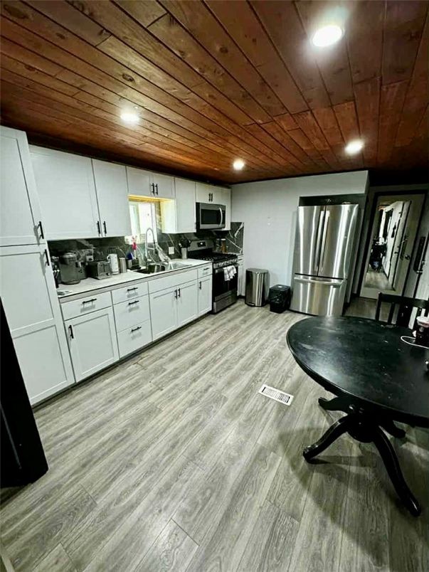 Interior, Kitchen, Recessed Lighting, Stainless Steel Appliances, Wooden Ceilings, Wood Texture Flooring