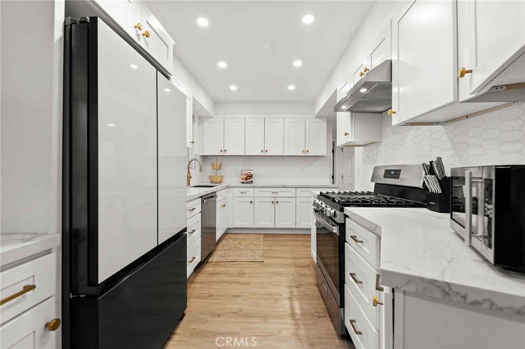 Interior, Kitchen, Recessed Lighting, Stainless Steel Appliances, Wood Texture Flooring