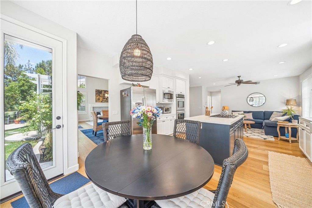 Dining room, Interior, Kitchen, Living room, Pendant Lights, Recessed Lighting, Stainless Steel Appliances, Wood Texture Flooring