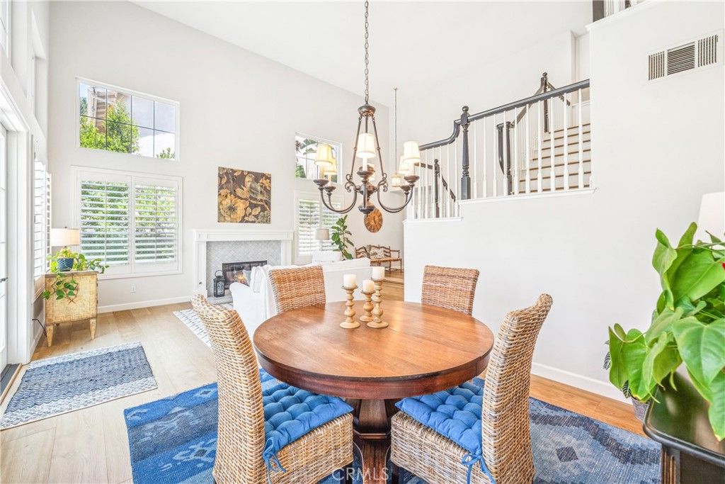 Chandelier, Dining room, Fireplace, Interior, Pendant Lights, Wood Texture Flooring