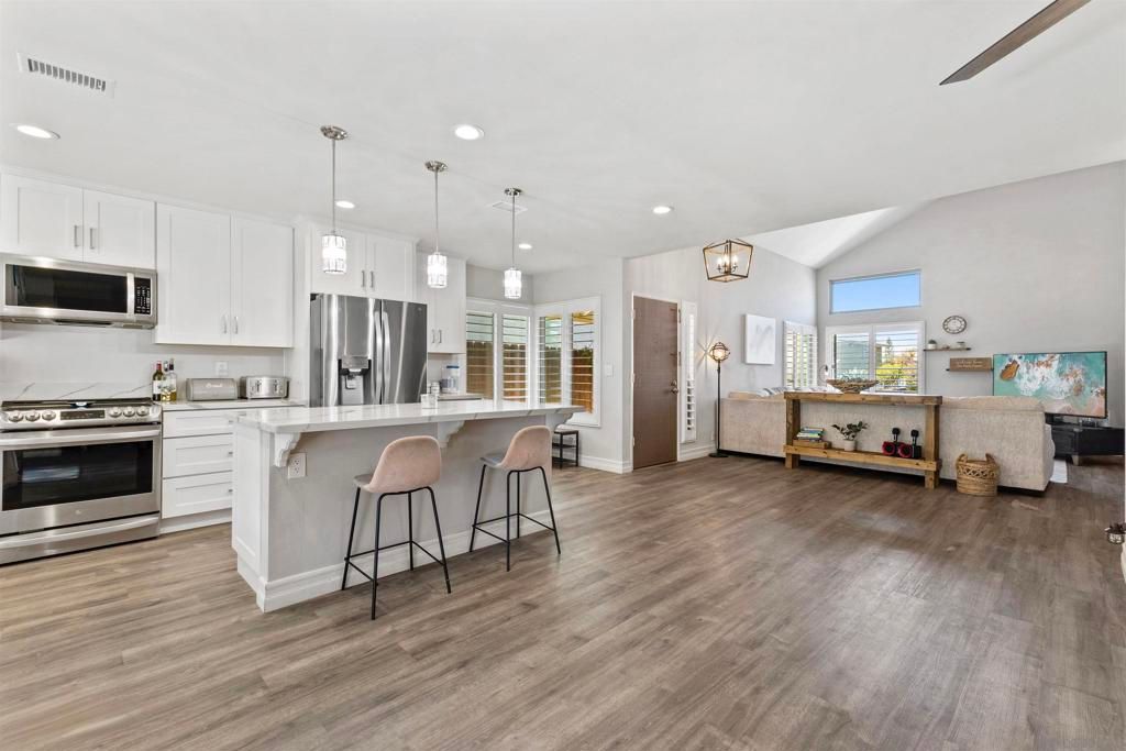 Interior, Kitchen, Pendant Lights, Recessed Lighting, Stainless Steel Appliances, Wood Texture Flooring