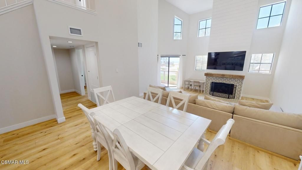 Dining room, Fireplace, Interior, Recessed Lighting, Wood Texture Flooring
