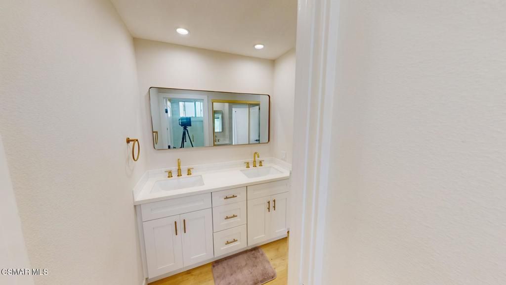 Bathroom, Dual Sink Vanities, Interior, Recessed Lighting, Wood Texture Flooring