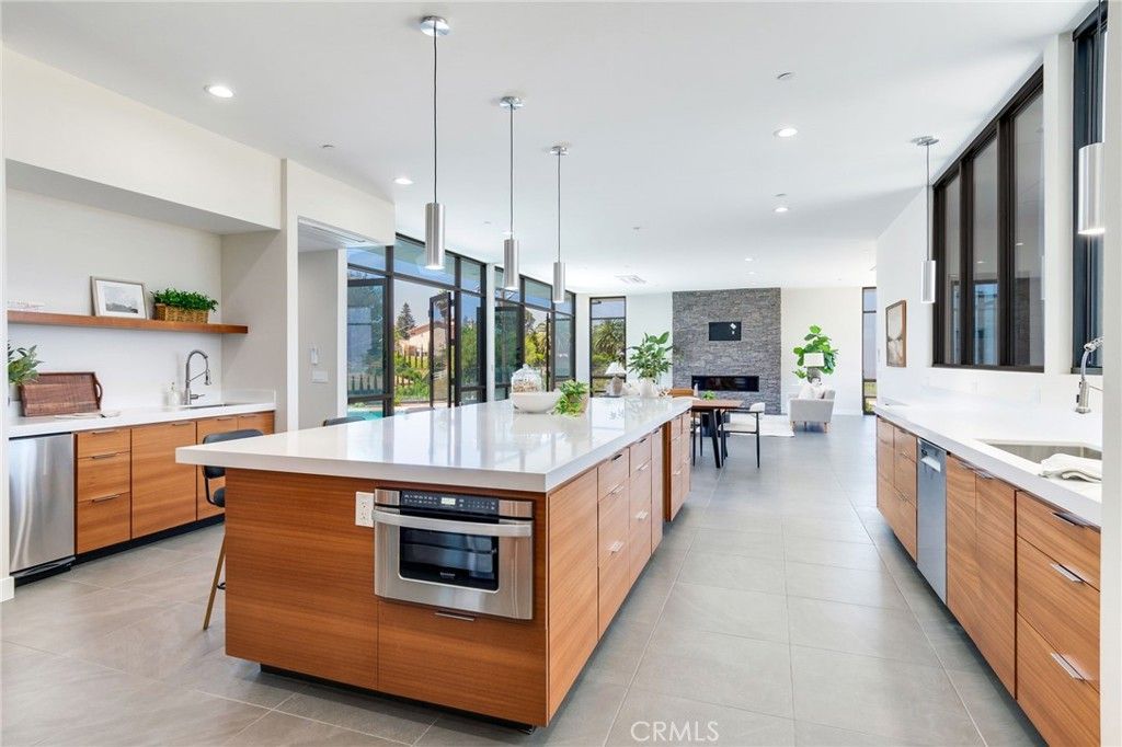 Dining room, Fireplace, Interior, Kitchen, Pendant Lights, Recessed Lighting, Stainless Steel Appliances, Stone Walls