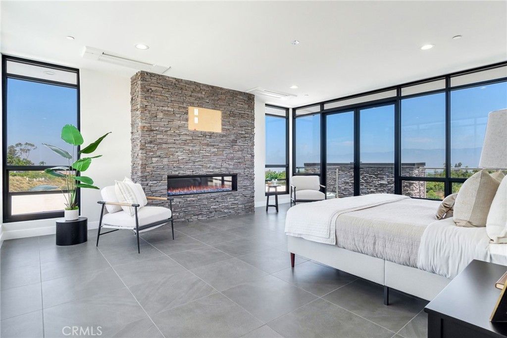 Bedroom, Fireplace, Interior, Recessed Lighting, Stone Walls, Water