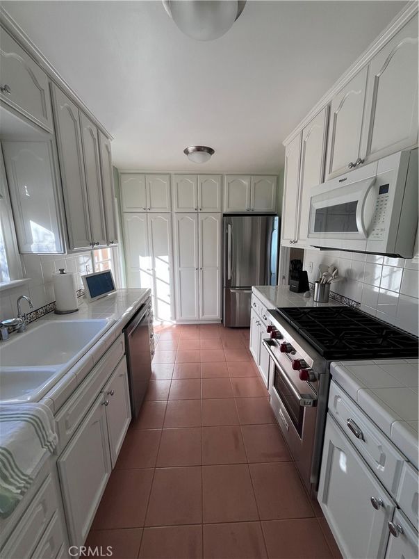 Interior, Kitchen, Stainless Steel Appliances, Tile Countertops