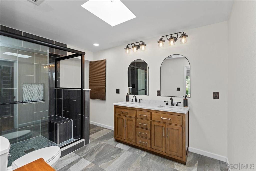 Bathroom, Dual Sink Vanities, Glass Shower, Interior, Recessed Lighting, Wood Texture Flooring