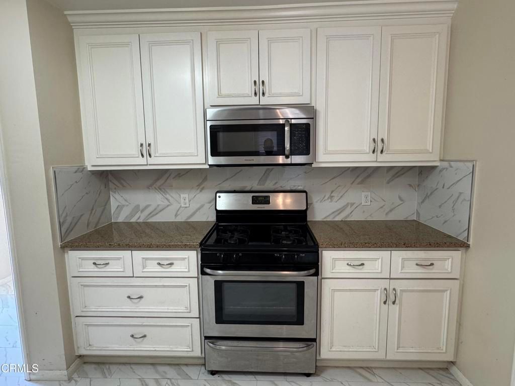 Interior, Kitchen, Marble, Marble Walls, Stainless Steel Appliances
