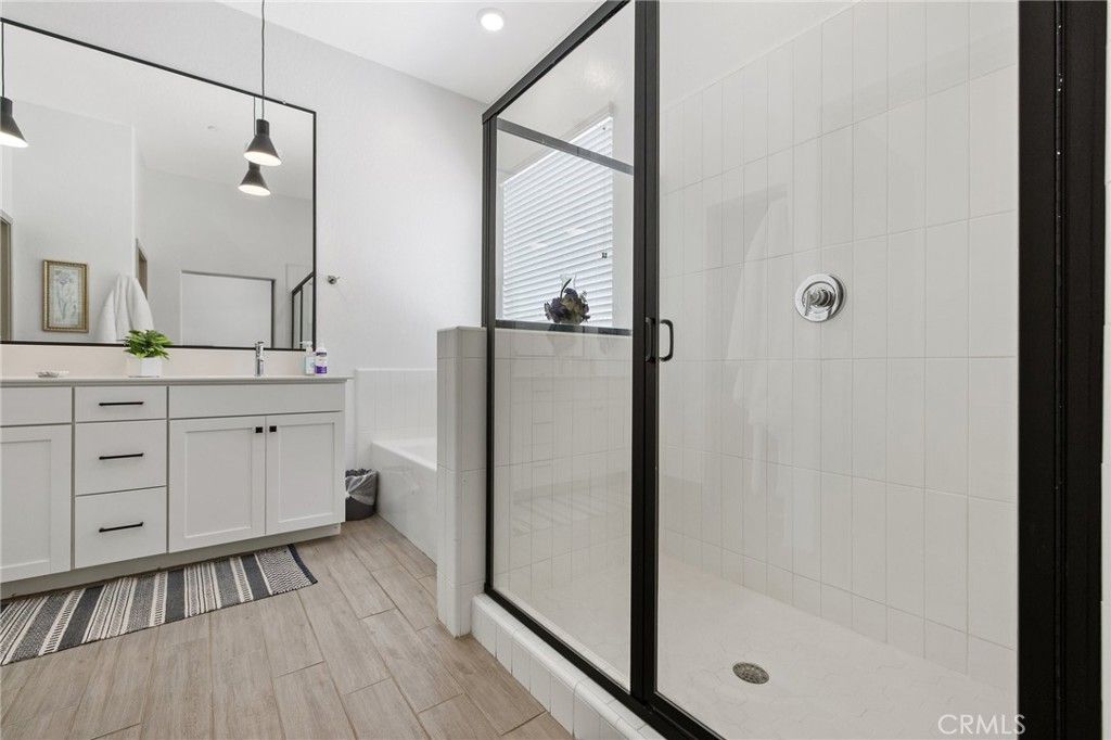 Bathroom, Glass Shower, Interior, Pendant Lights, Recessed Lighting, Wood Texture Flooring