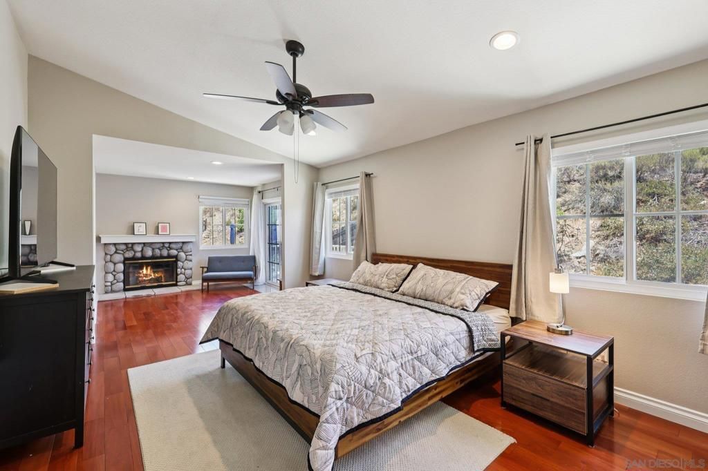 Bedroom, Fireplace, Interior, Recessed Lighting, Wood Texture Flooring