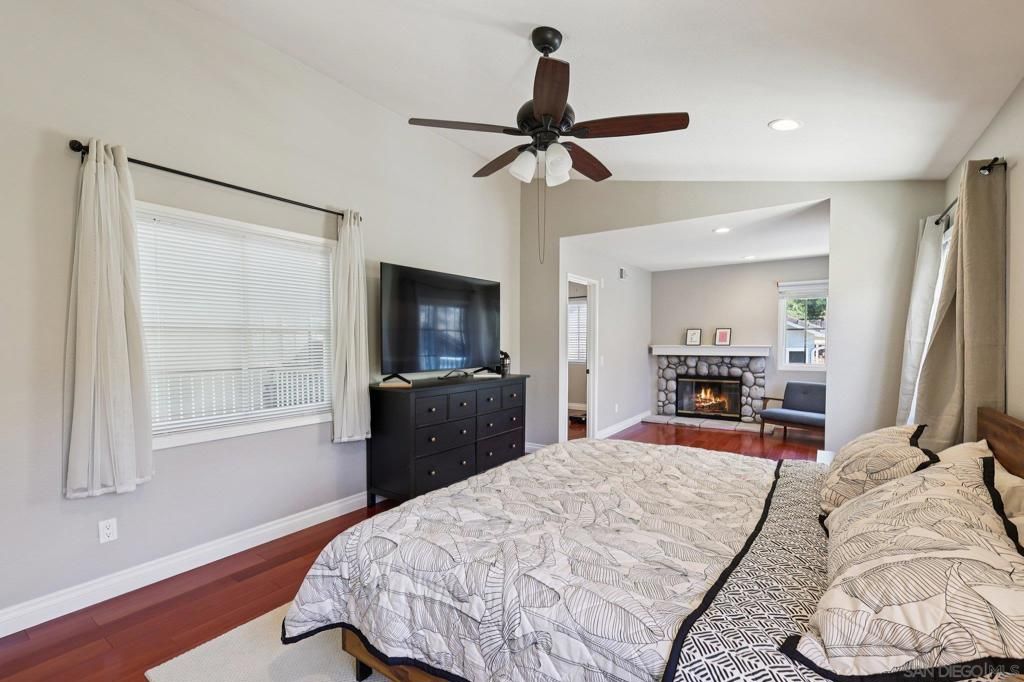 Bedroom, Fireplace, Interior, Recessed Lighting, Wood Texture Flooring