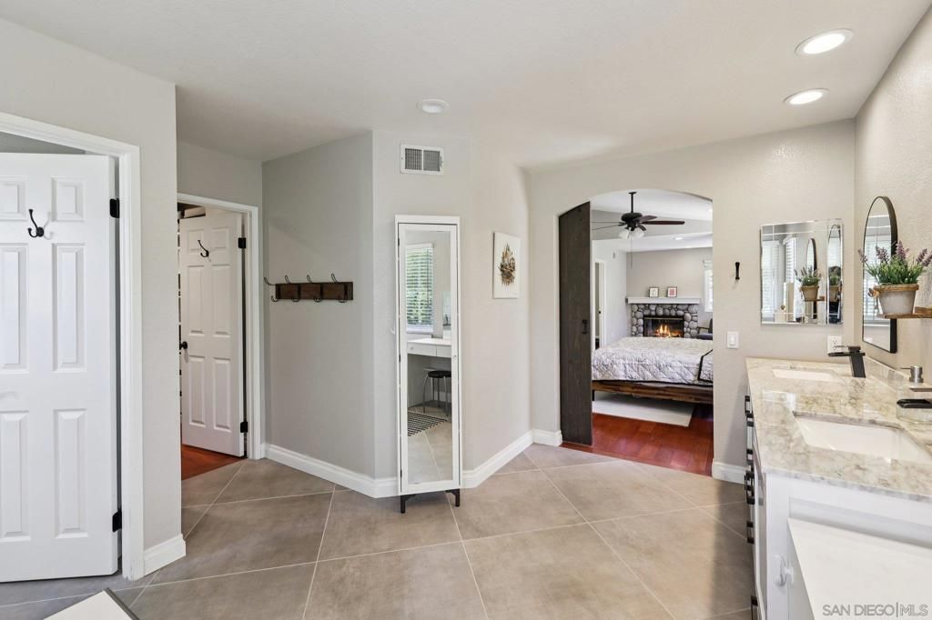Bathroom, Bedroom, Dual Sink Vanities, Interior, Recessed Lighting, Wood Texture Flooring