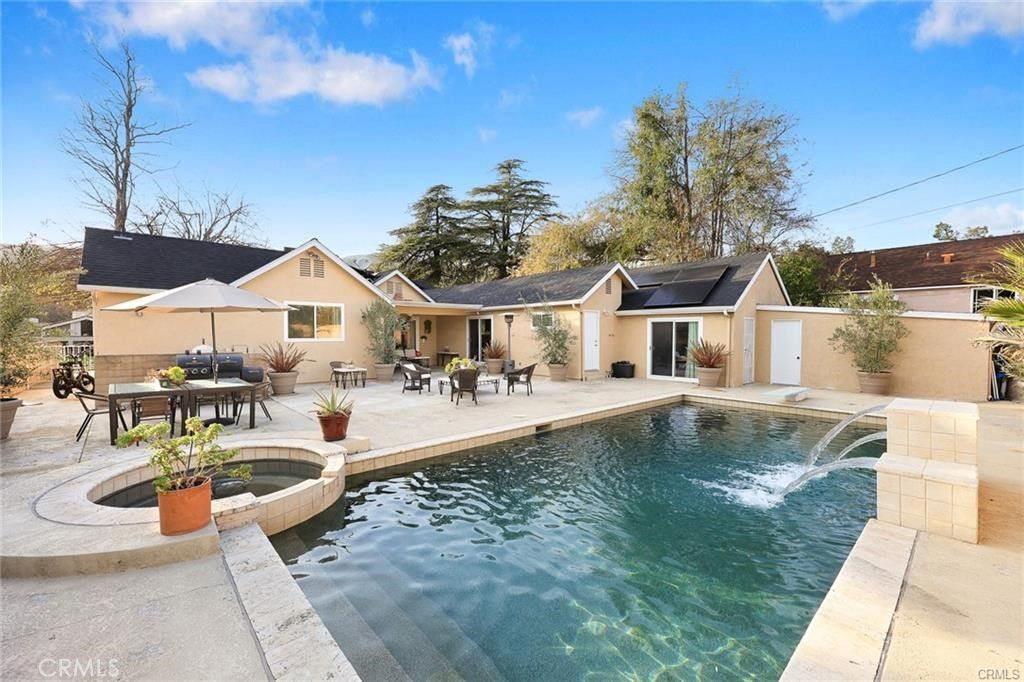 Exterior, Pool, Solar Panels