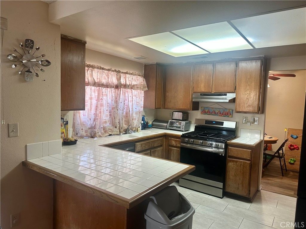 Interior, Kitchen, Tile Countertops, Wood Texture Flooring