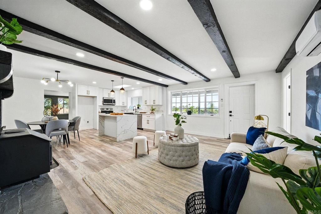Dining room, Interior, Kitchen, Living room, Pendant Lights, Recessed Lighting, Stainless Steel Appliances, Wooden Beams, Wood Texture Flooring