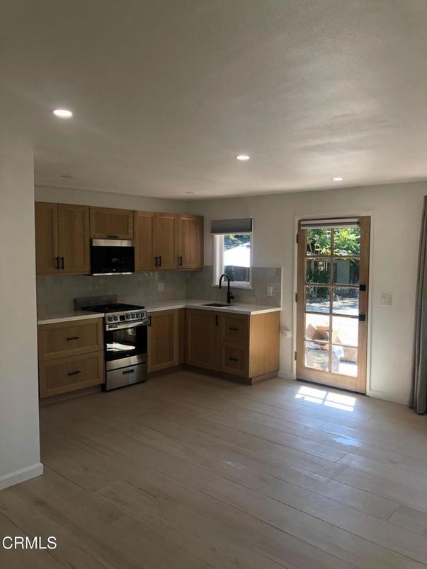 Interior, Kitchen, Recessed Lighting, Stainless Steel Appliances, Wood Texture Flooring