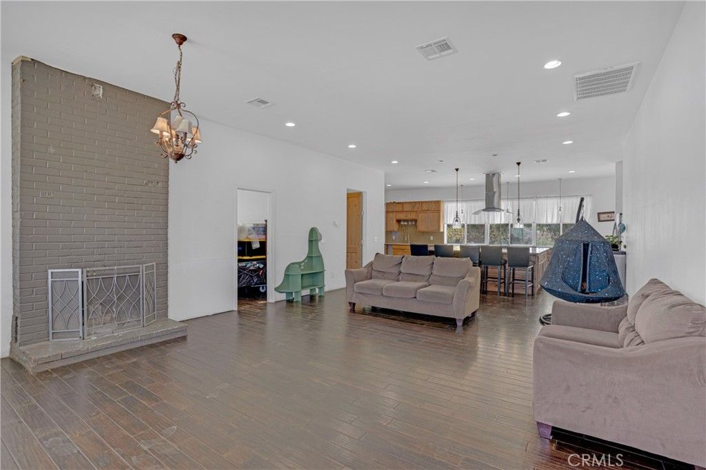 Dining room, Interior, Kitchen, Living room, Pendant Lights, Recessed Lighting, Stone Walls, Wood Texture Flooring