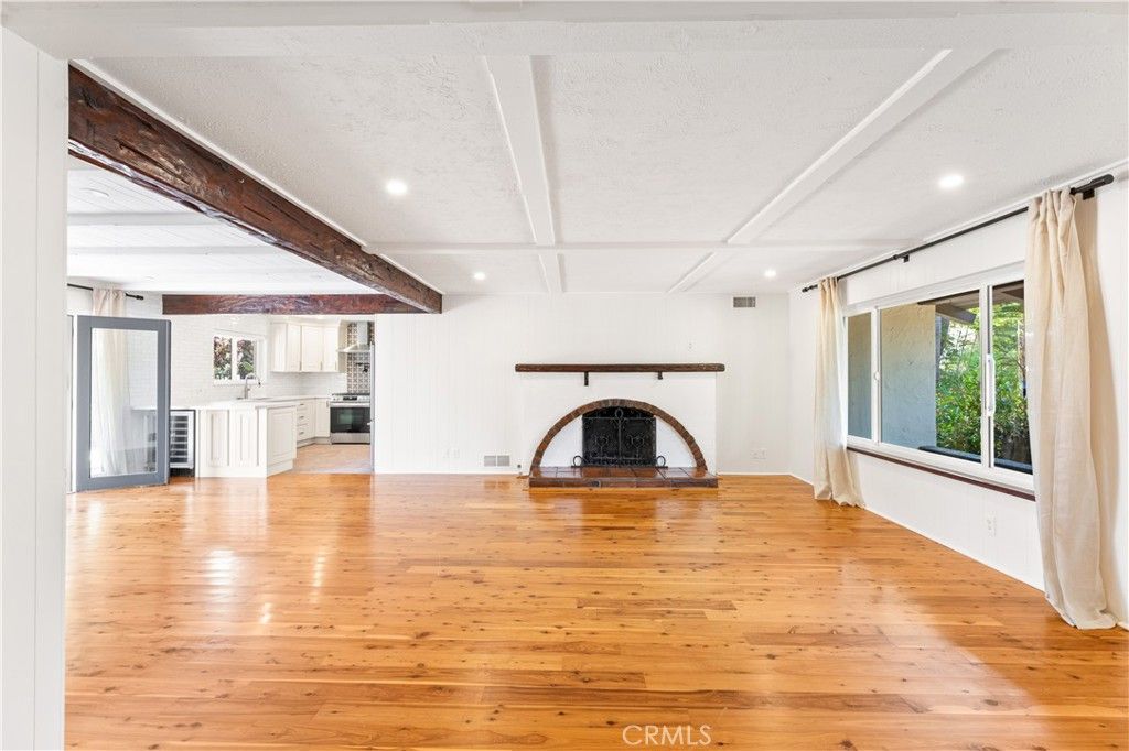 Empty room, Fireplace, Interior, Kitchen, Recessed Lighting, Wooden Beams, Wood Texture Flooring