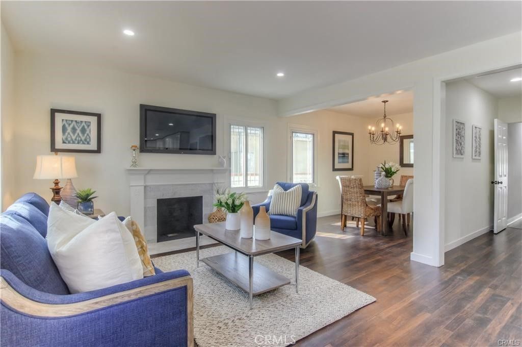 Chandelier, Dining room, Fireplace, Interior, Living room, Recessed Lighting, Wood Texture Flooring