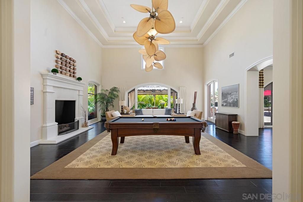 Billiard Table, Fireplace, Game Room, Interior, Pendant Lights, Recessed Lighting, Wood Texture Flooring