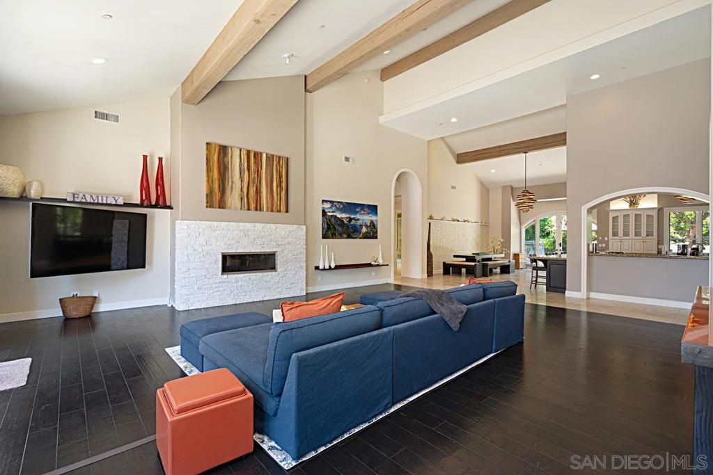 Dining room, Fireplace, Interior, Living room, Pendant Lights, Recessed Lighting, Wooden Beams, Wood Texture Flooring