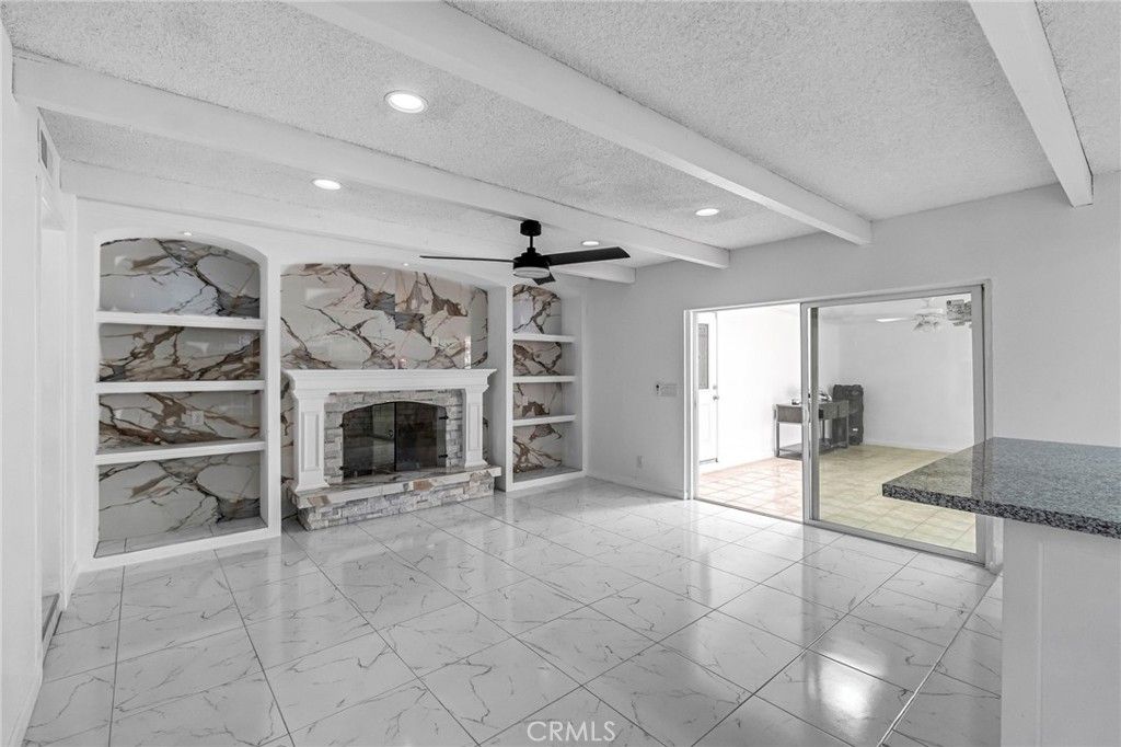 Empty room, Fireplace, Interior, Marble, Recessed Lighting, Stone Walls