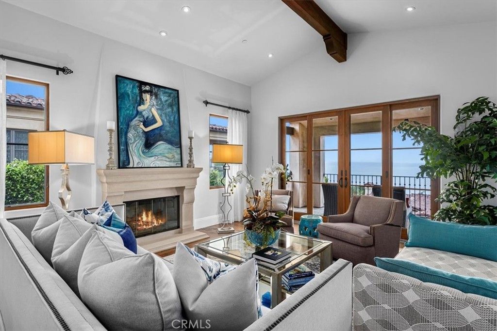 Fireplace, Interior, Living room, Recessed Lighting, Water, Wooden Beams