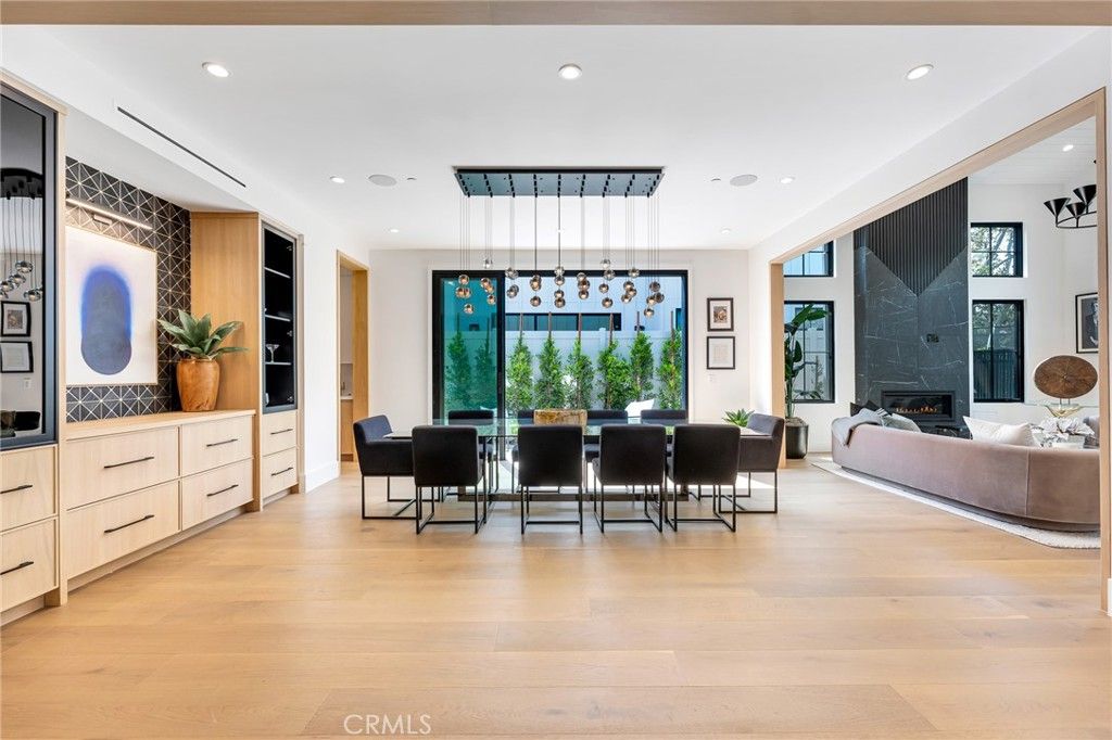 Dining room, Fireplace, Interior, Living room, Pendant Lights, Recessed Lighting, Wood Texture Flooring