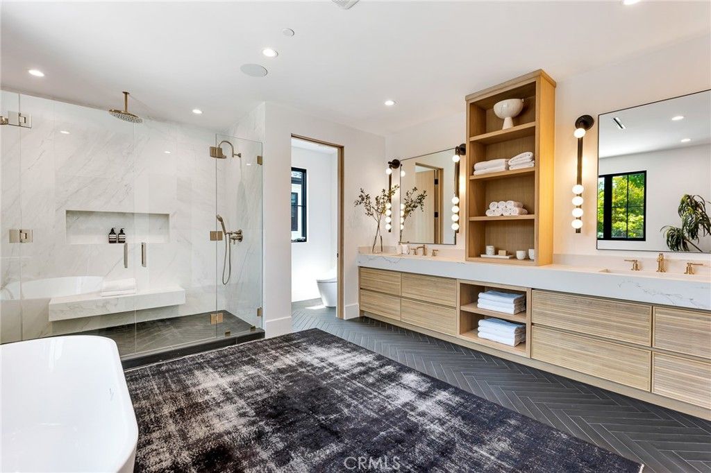 Bathroom, Dual Sink Vanities, Free Standing Baths, Glass Shower, Interior, Marble Walls, Recessed Lighting