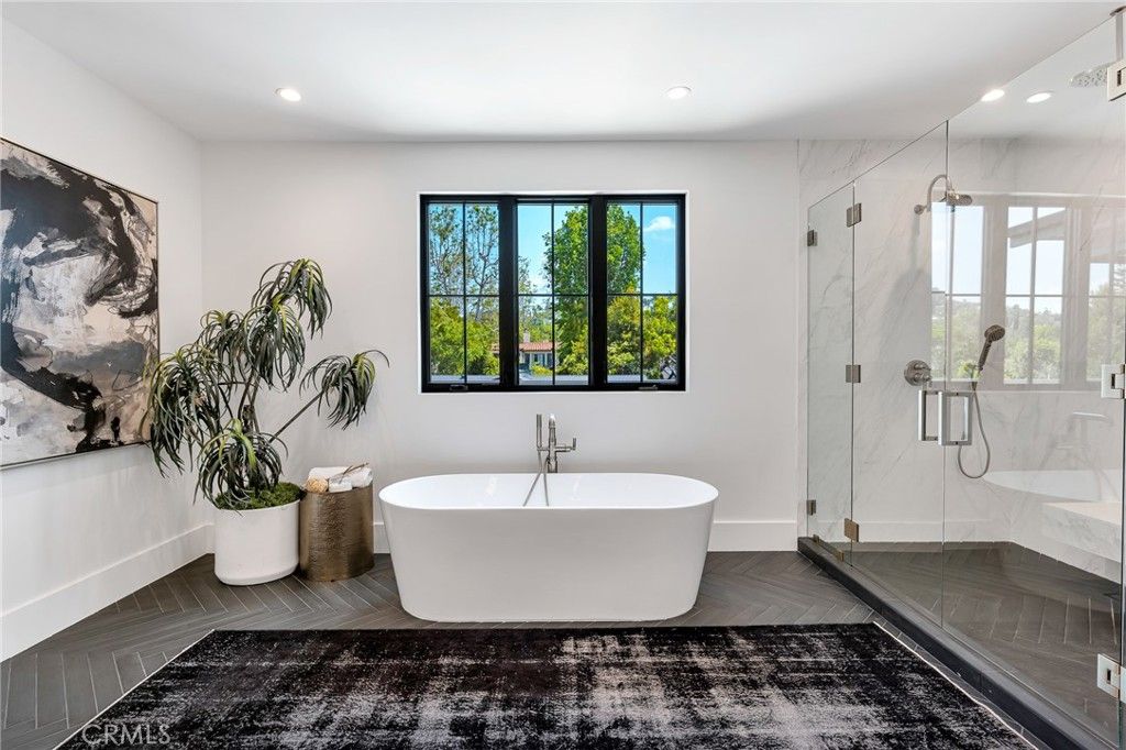 Bathroom, Free Standing Baths, Glass Shower, Interior, Marble Walls, Recessed Lighting, Wood Texture Flooring