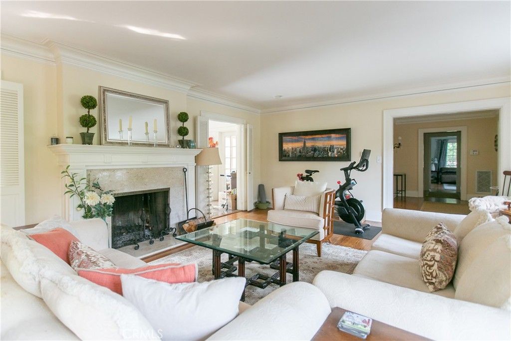 Fireplace, Fitness Equipment, Interior, Living room, Recessed Lighting, Wood Texture Flooring