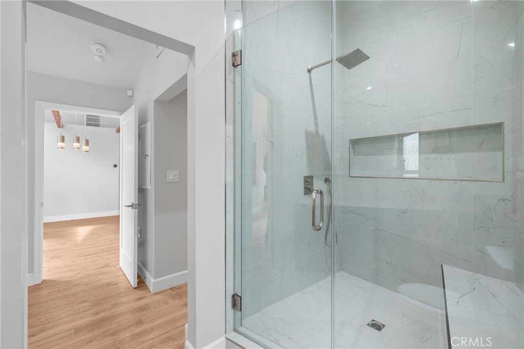 Bathroom, Glass Shower, Interior, Marble Walls, Wood Texture Flooring