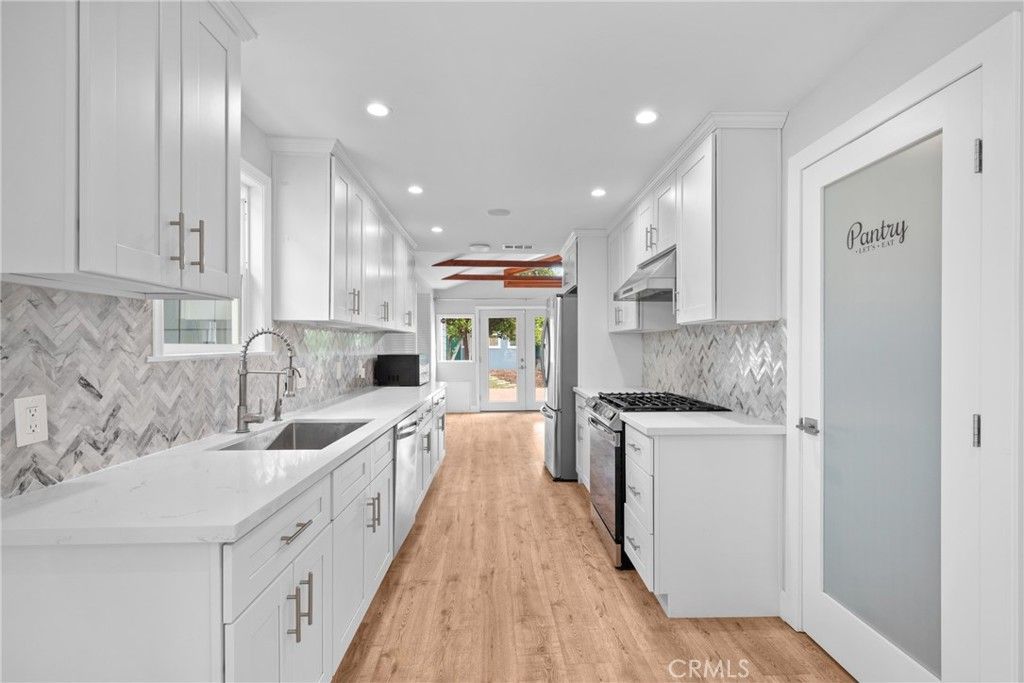 Interior, Kitchen, Marble Walls, Recessed Lighting, Wood Texture Flooring