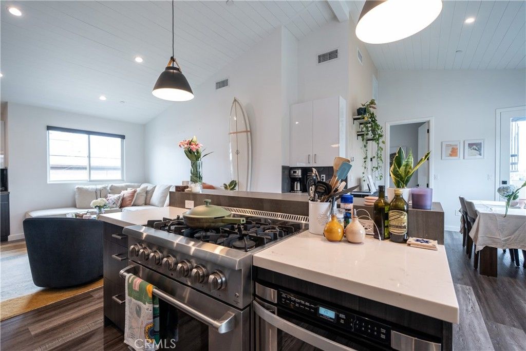 Dining room, Interior, Kitchen, Living room, Pendant Lights, Recessed Lighting, Stainless Steel Appliances, Wood Texture Flooring