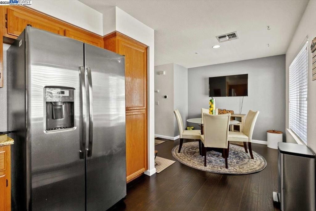 Dining room, Interior, Kitchen, Recessed Lighting, Stainless Steel Appliances, Wood Texture Flooring