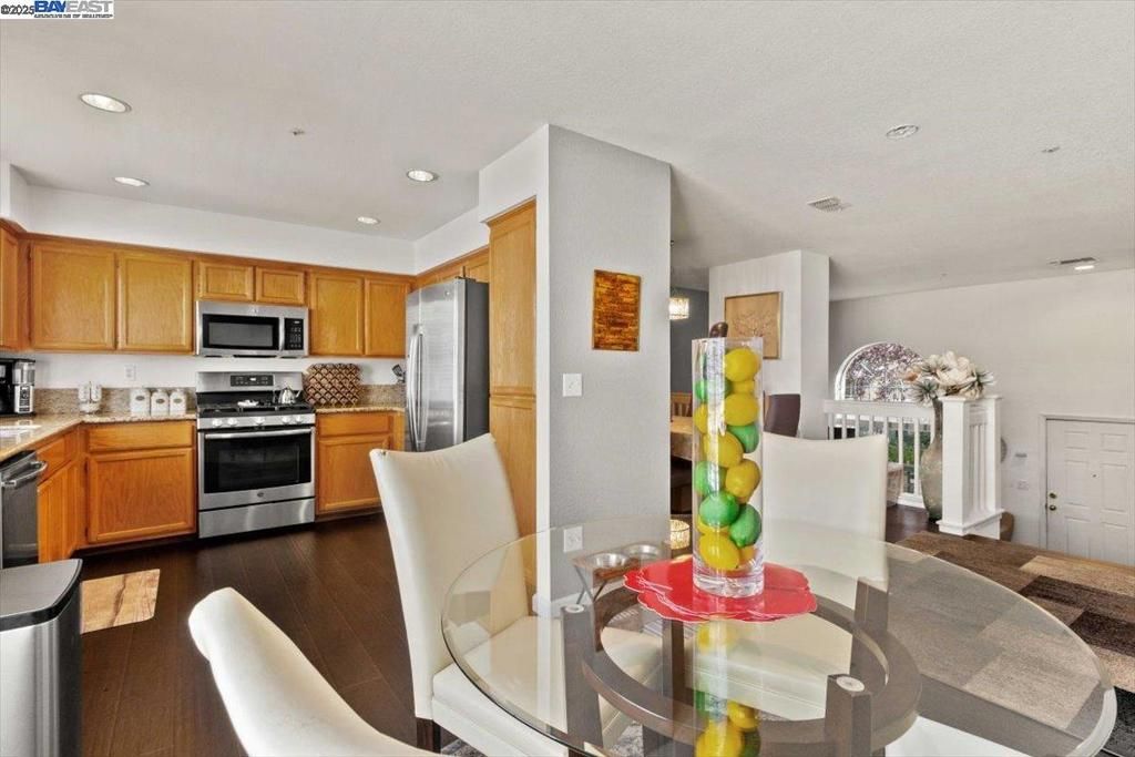 Dining room, Interior, Kitchen, Recessed Lighting, Stainless Steel Appliances, Wood Texture Flooring