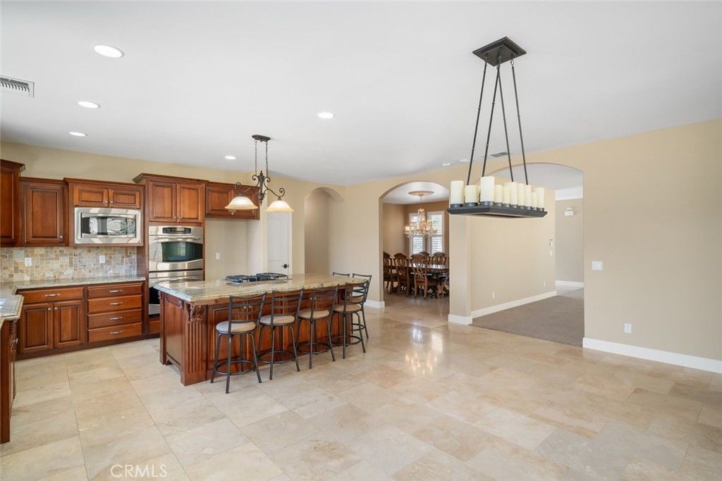Chandelier, Dining room, Interior, Kitchen, Pendant Lights, Recessed Lighting, Stainless Steel Appliances