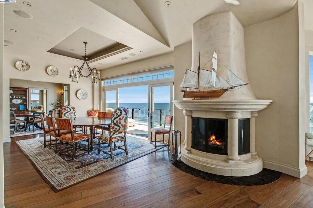 Chandelier, Dining room, Fireplace, Interior, Recessed Lighting, Water, Wood Texture Flooring