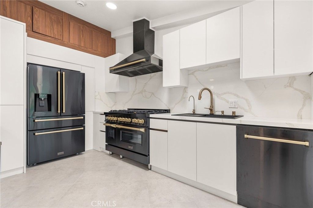 Interior, Kitchen, Marble Walls, Recessed Lighting, Stainless Steel Appliances