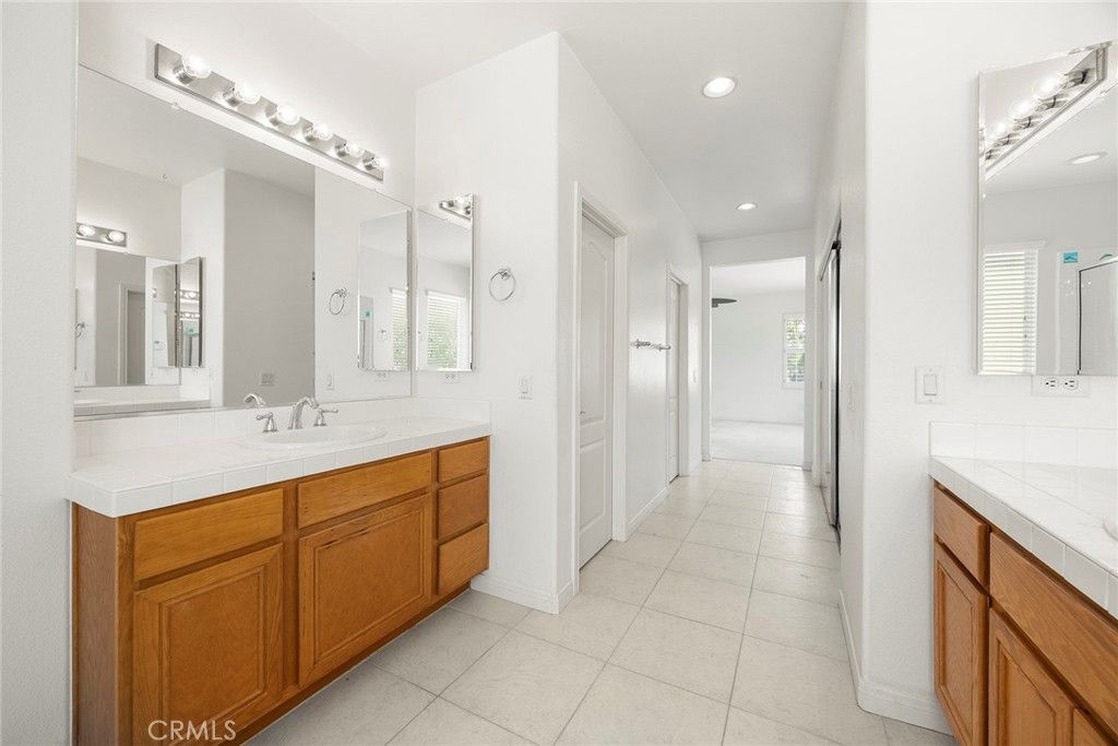 Bathroom, Dual Sink Vanities, Interior, Recessed Lighting, Tile Countertops