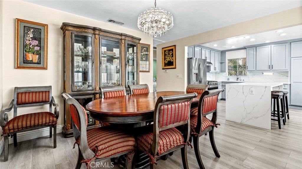 Chandelier, Dining room, Interior, Kitchen, Marble Walls, Recessed Lighting, Wood Texture Flooring