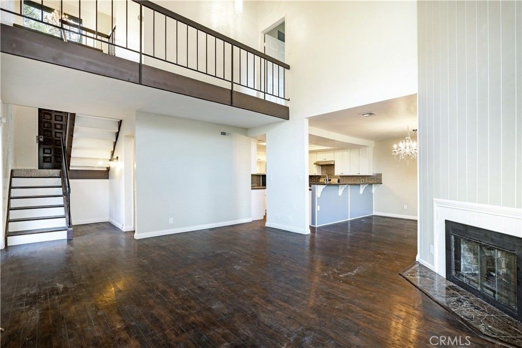 Chandelier, Fireplace, Interior, Recessed Lighting, Wood Texture Flooring